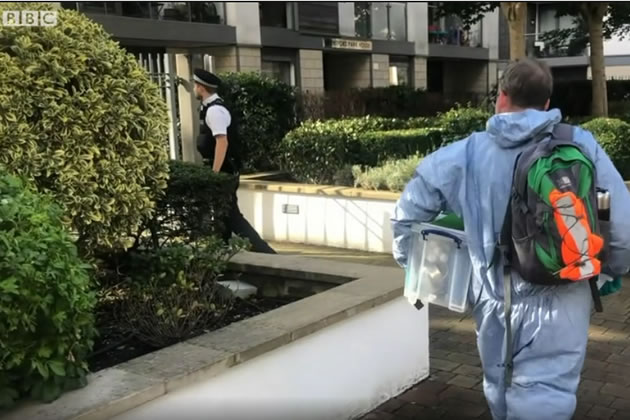 Forensics officers arrive at the scene