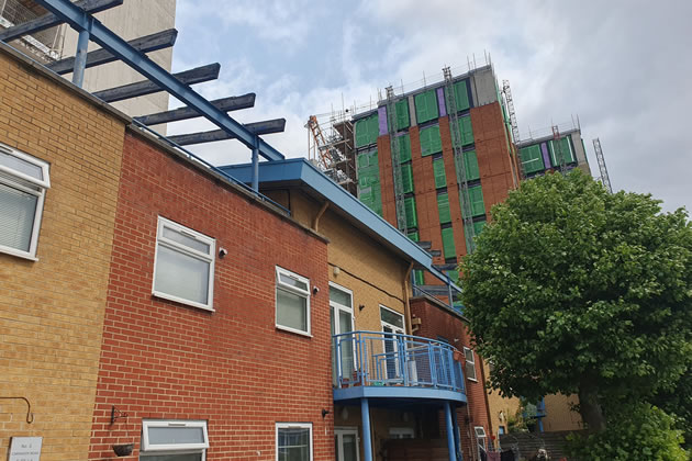 New flats tower over Mr McGinty's flat 