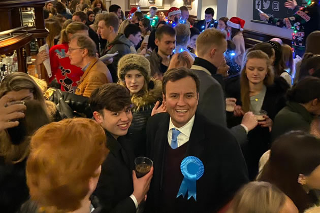 Greg Hands campaigning in a local pub