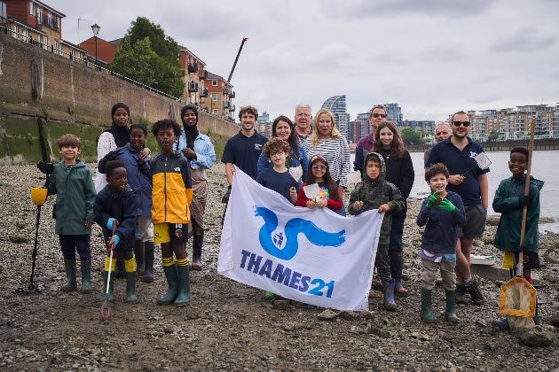 Local people on the foreshore at a previous clean up event 