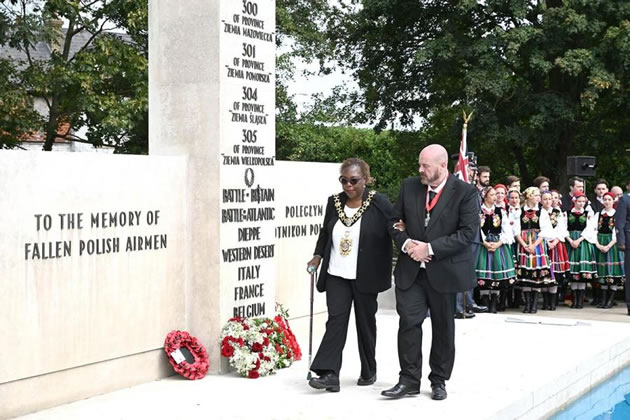 H&F Mayor Sharon Holder at the Polish Air Force Memorial accompanied by her consort